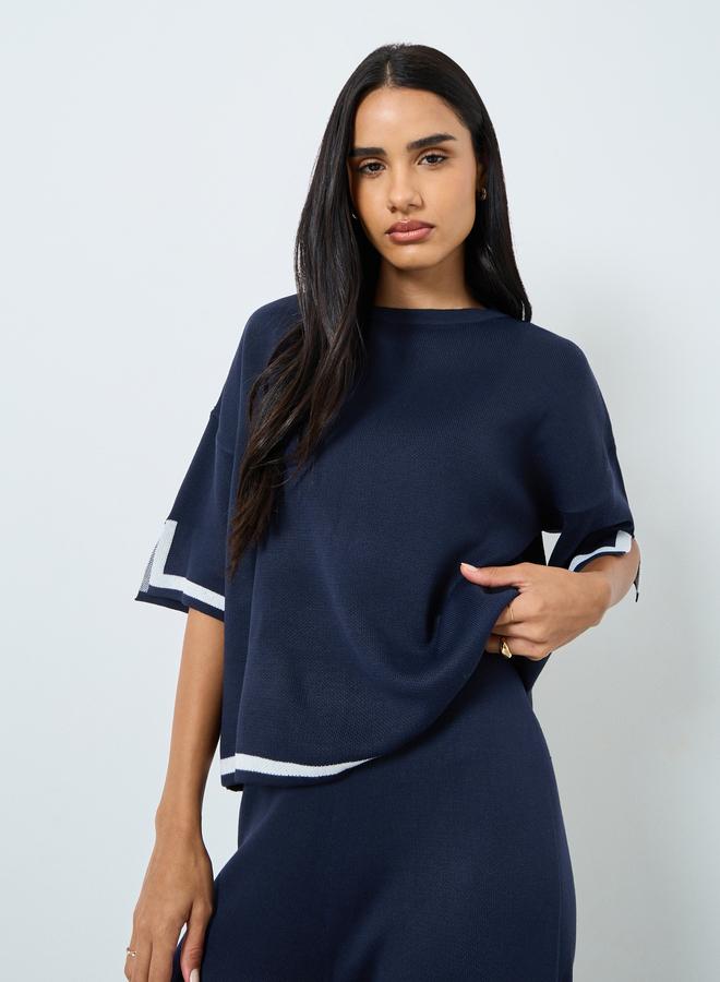 ستايلي بلوزة بتفاصيل مُتباينة مع أكمام بشق - Image 1